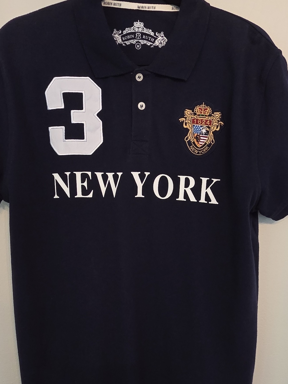 Robin Ruth Navy Polo with White Crest Detail